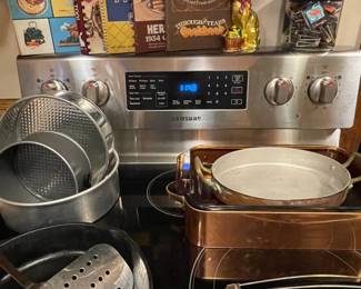 glass-top stove Samsung, baking dishes, copper pans