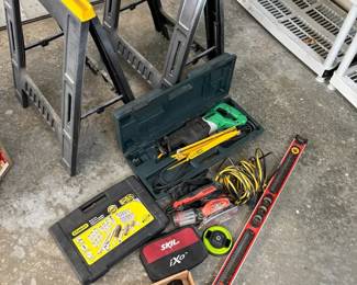  016 Hitachi Reciprocating Saw, Saw Horses, Level, Socket Set And Other Items