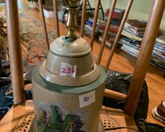 #236	pottery lamp with paintin g on it	 $75.00 			