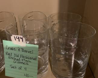 #198	crate and barrel reef old fashioned etched fish glasses	 $40.00 			