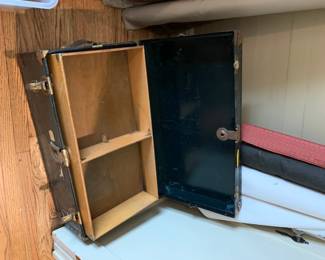 #039	Black Metal Trunk w/Tray and brass fittings - as is condition - 31x17x13	 $35.00 			