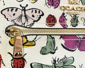 #270	Coach limited edition, mini Rowan file Crossebody bag in creature chalk print Butterflies and gugs outer at pocket gold town harware NWOT	 $45.00 			