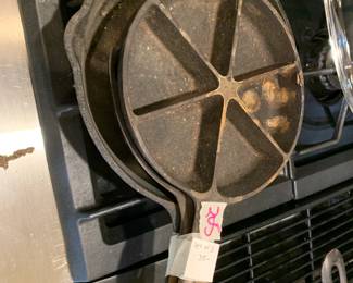 #205	3 iron skillets	 $35.00 			