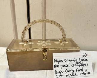 #262	Myles Original Lucite Box purseCarved floral w twist handle exterior 	 $60.00 			