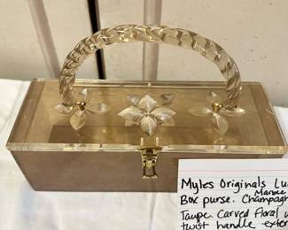 #262	Myles Original Lucite Box purseCarved floral w twist handle exterior 	 $60.00 			