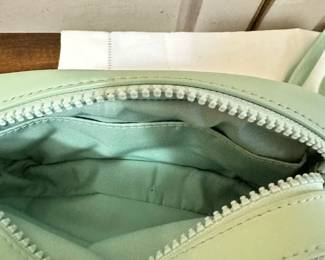 #261	Tory Burch Perrry Bombe Camera/crossbody bag in mint matte leather double zip remoable strap 	 $70.00 			