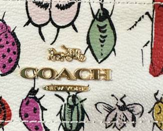 #270	Coach limited edition, mini Rowan file Crossebody bag in creature chalk print Butterflies and gugs outer at pocket gold town harware NWOT	 $45.00 			
