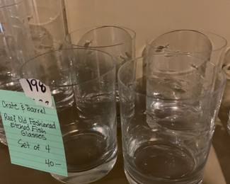 #198	crate and barrel reef old fashioned etched fish glasses	 $40.00 			