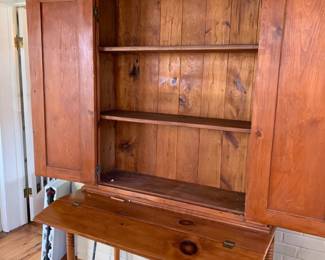 #018	Knotty Pine Desk w/1 drawers and 2 doors w/2 wood shelves - 44x20-25x79	 $220.00 			