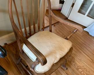 #007	arched back primative rocking chair with cushion	 $75.00 			