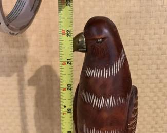 #195	22 inch tall carved bird on stand	 $45.00 			