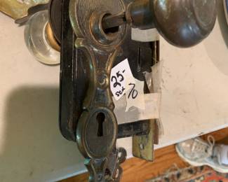 #070	Lock Set w/Glass Knobs and Brass Knobs	 $25.00 			