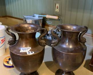 #086	Pair of Brass Coy Double Handled vases - 10" Tall	 $40.00 			