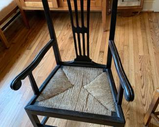 #003	black arm chair with cain seat 	 $45.00 			