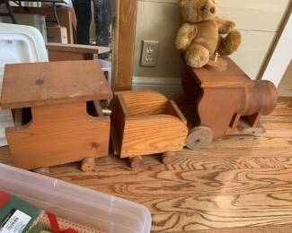 #027	Three piece wood train set - 13" Tall x 41" Long	 $40.00 			