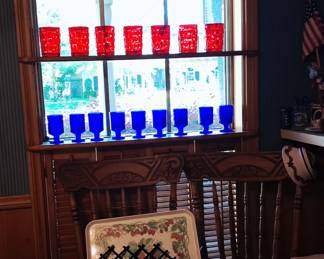 Antique chairs and vintage glassware