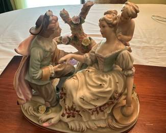 $25.00 - Decorative Porcelain Courting Couple with Child