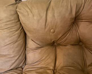 One Tufted Button Has Come Loose, Button Still Present