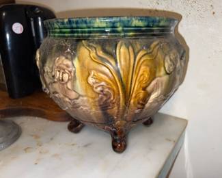 Antique ceramic planter featuring a Majolica -style glaze