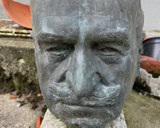 Let us know who you think this is a bust of....We think it might be Harry S. Truman.