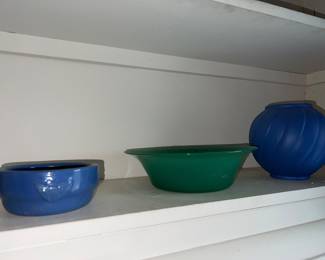 Stoneware bowls in blue and green and blue round vase
