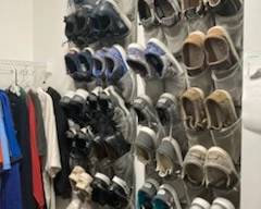 Dozens of Hey Dude shoes like new