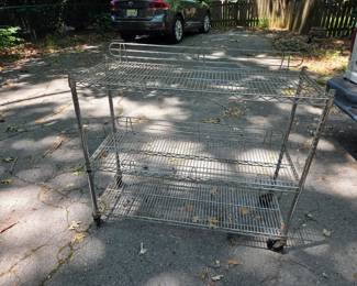 #319	Rolling metal shelf 3 shelves 48x18x40	 $55.00 