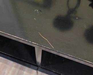 #107	Black Laminate TV Stand (as is missing handle) 60x19x23 	 $45.00 