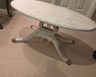#140	White-Washed Wood Oval Coffee Table w/Brass Claw Feet - 36x20x17	 $75.00 