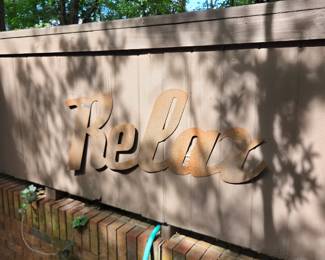 #203	Metal Relax Sign - 43"W x 19T	 $25.00 