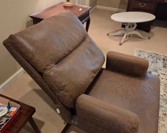 #142	Ovios Brown Suede Side Chair that lays back w/ottoman - 24x15x15 (finish issues on legs) 	 $100.00 