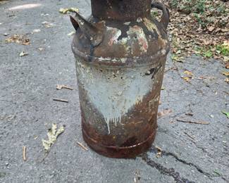 #324	Tall metal milk jug 25" tall 	 $35.00 