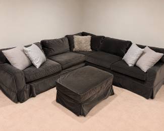 Mitchell Gold / Bob Williams gray slip covered sectional with storage ottoman