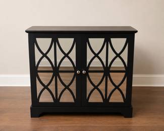 Black mirrored cabinet with fretwork from Ballard Designs