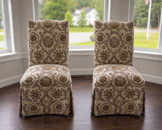 Pair of slipper chairs with skirts in browns & tans