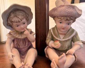 Porcelain children figurines