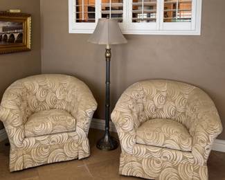 Pair of swivel barrel chairs
