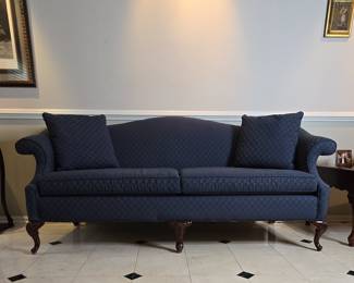 Camelback Sofa with Carved Wooden Legs