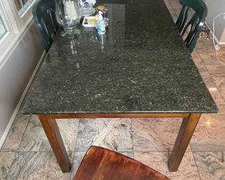 Granite Top Dining Table with Green Chairs