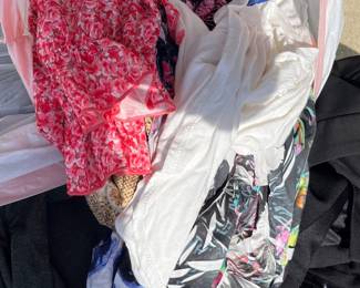 large back of assorted clothing, $25
