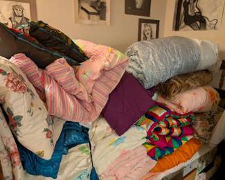 Many nice comforters and towels, including several beautiful Korean comforters
