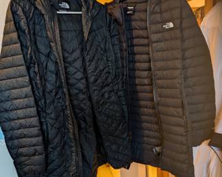 The North Face jackets, including 2 longer black puffers