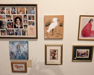 Modest collection of framed wall art.