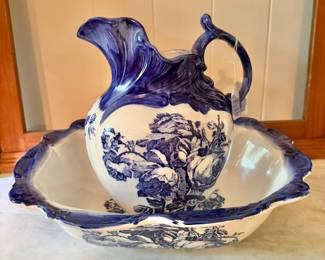 Flow blue pitcher and bowl