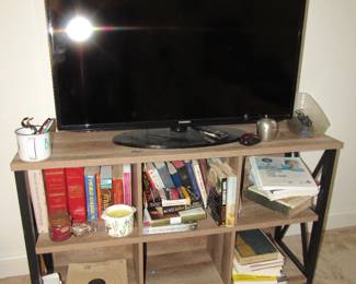 Samsung TV, books and nice little media shelf