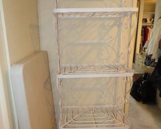 Tall white bakers rack.
