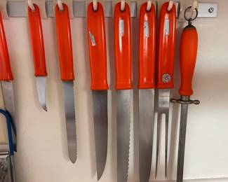Hanging rack of Henckels knives.