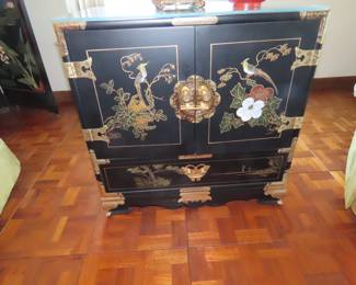 Asian style end table cabinet.