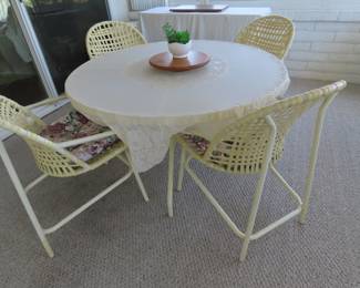 Nice clean kept inside patio table/chairs.