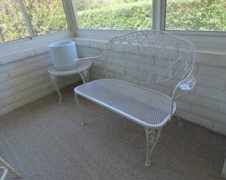 Nice white wire/metal seat and end table kept inside.
